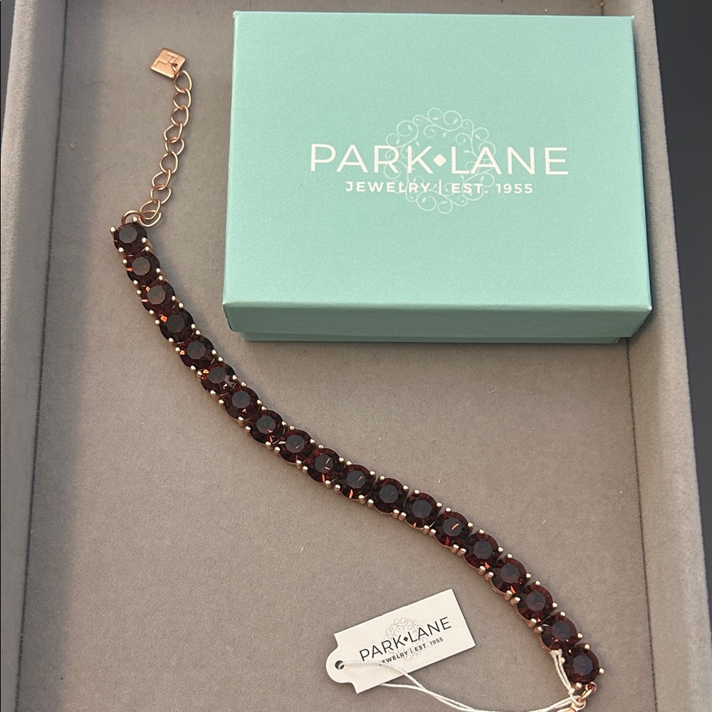 Park Lane Impression Bracelet with Rich Garnet Stones set in Rose Gold